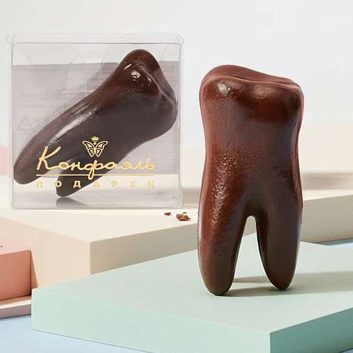 "Зуб" скульптура молочный шоколад